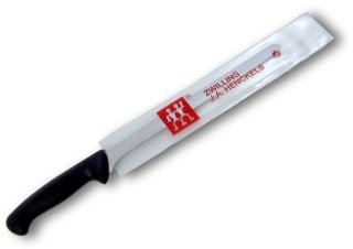 Master ham carving knife in its plastic sheath